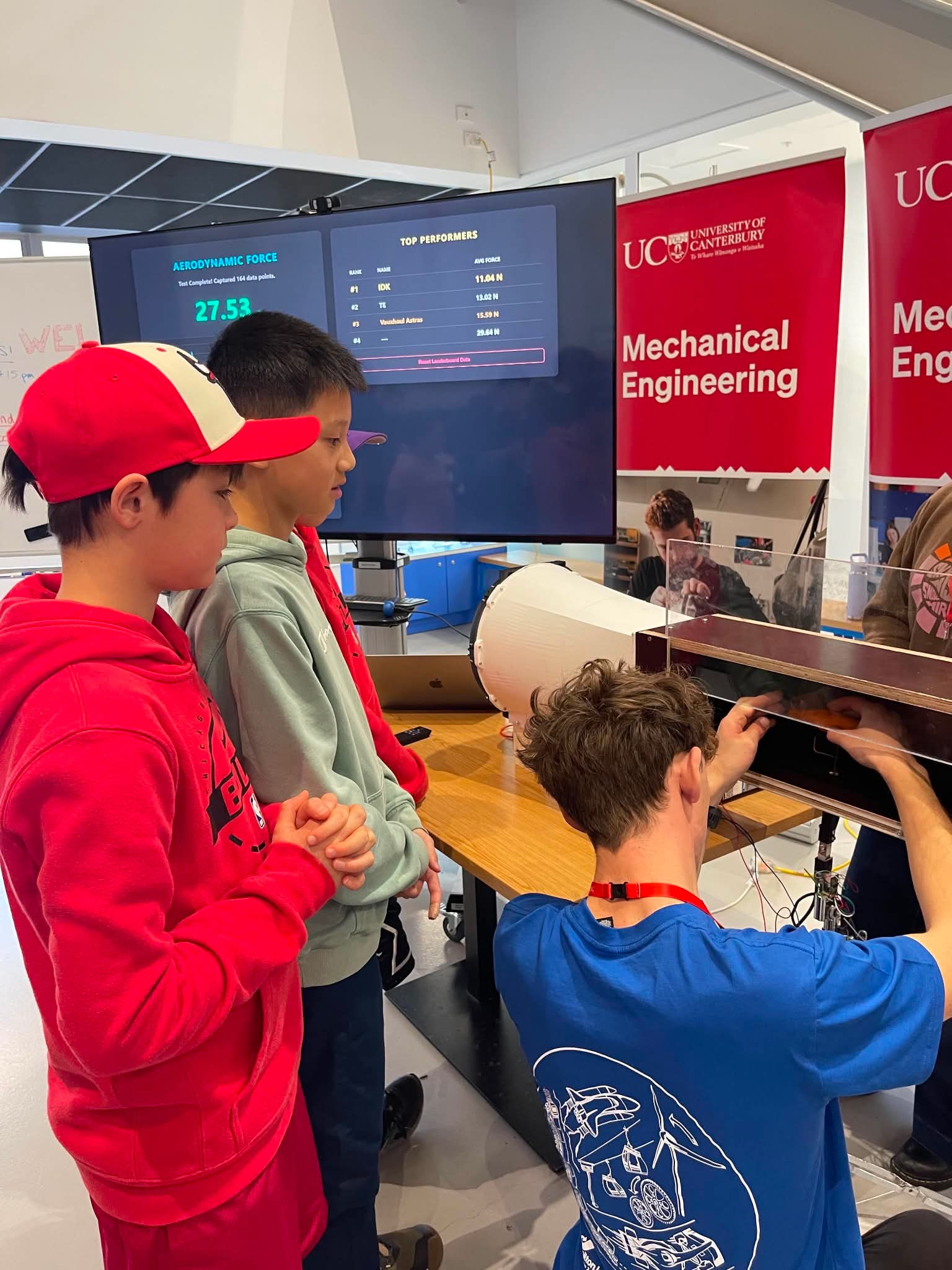 Putting a group of children's vehicle into the wind tunnel.