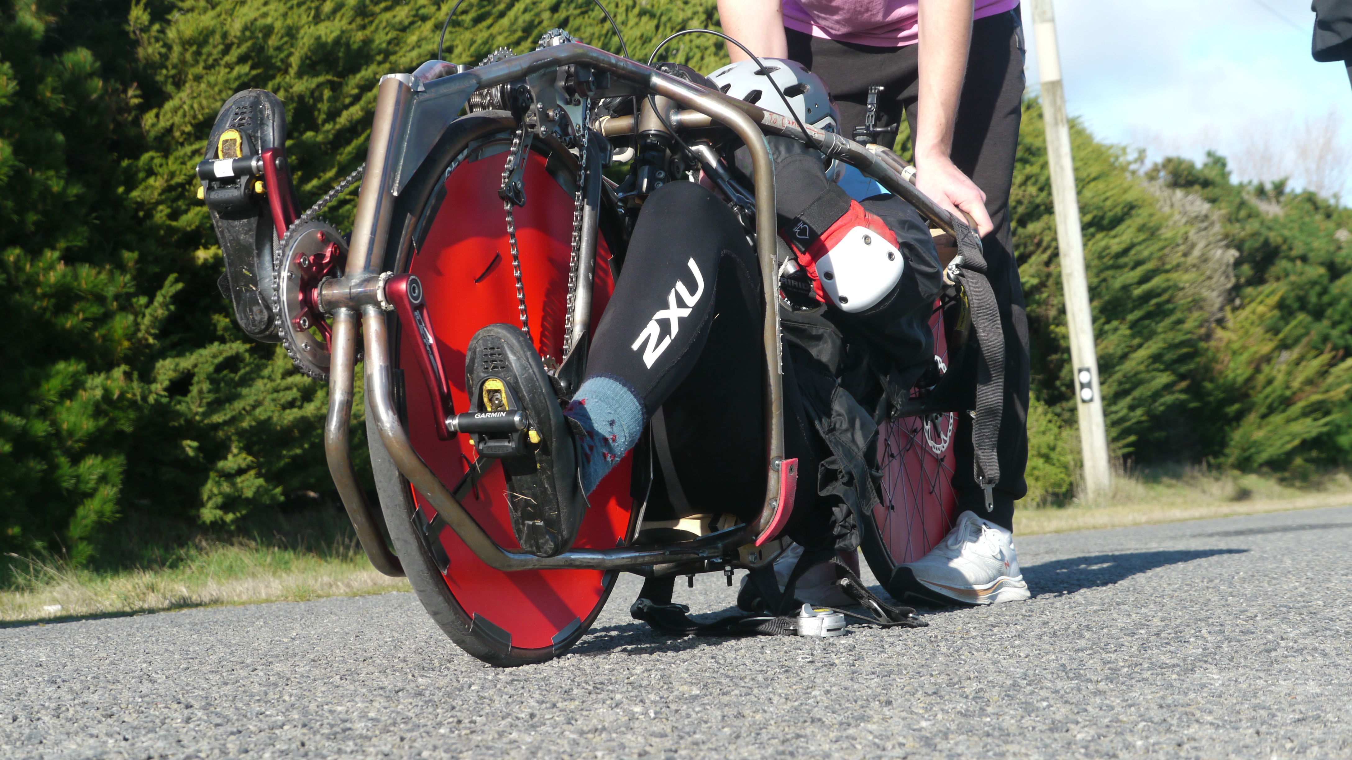 Maroro on a testing day without its aerodynamic fairing, showing the rider position and the bike's mechanical components.